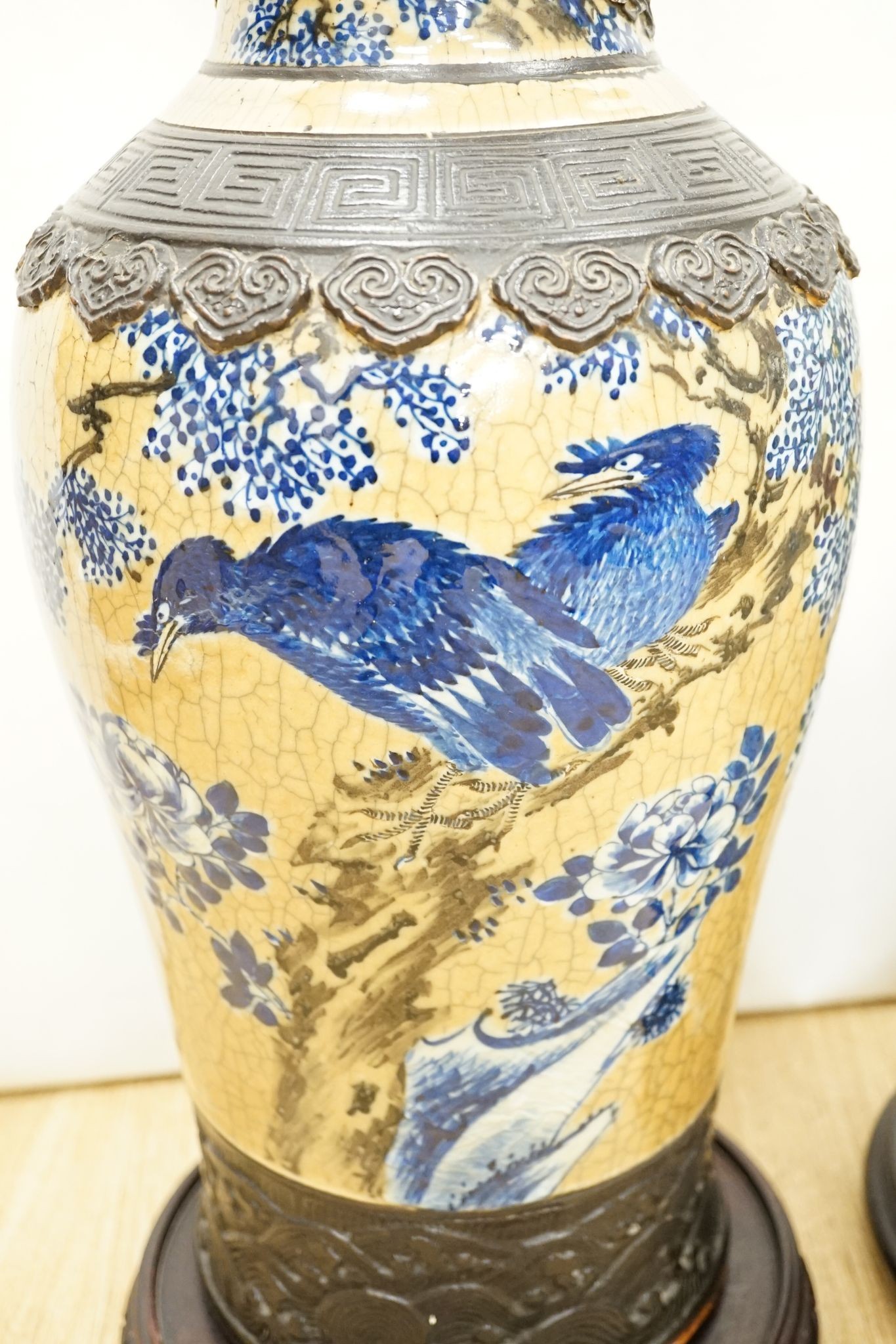 A large Chinese crackle glaze vase, late 19th/early 20th century and a large Chinese famille rose vase, late 19th century, tallest 60 cm.